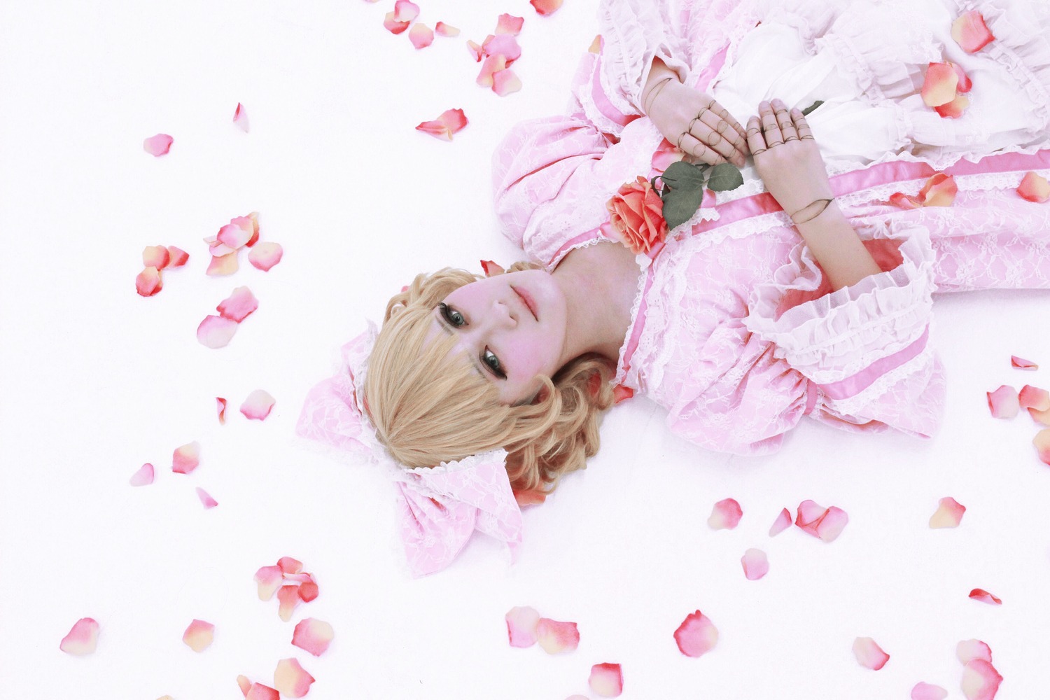 1girl blonde_hair dress earrings flower hinaichigo jewelry lips petals pinstripe_pattern red_flower rose rose_petals short_hair solo striped striped_background vertical-striped_dress vertical_stripes