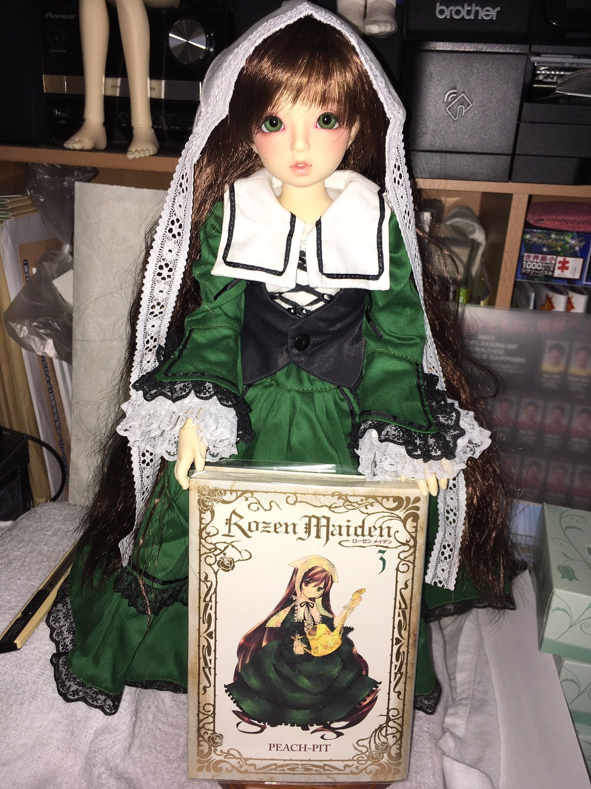 1girl bangs brown_hair doll dress green_dress green_eyes long_hair long_sleeves solo standing suiseiseki very_long_hair