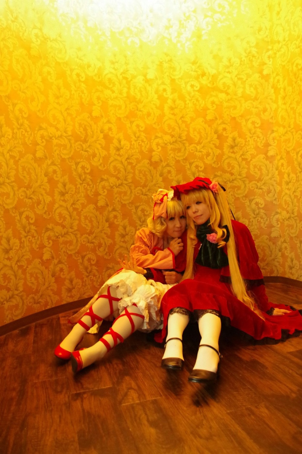 2girls aki_minoriko aki_shizuha apron blonde_hair closed_eyes dress hair_ornament hand_on_another's_head hat long_hair multiple_cosplay multiple_girls ribbon short_hair sitting smile tagme