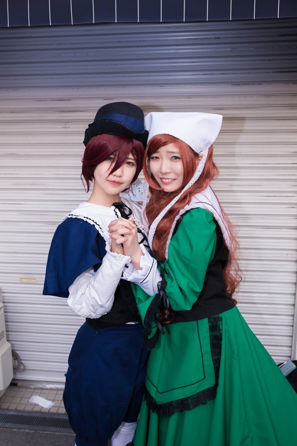2girls blue_eyes brown_hair dress green_dress green_eyes hat holding_hands lips long_hair looking_at_viewer makeup multiple_cosplay multiple_girls red_hair short_hair siblings sisters smile tagme twins
