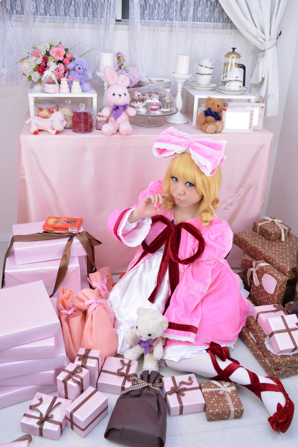 1girl bed bedroom blonde_hair blue_eyes curtains dress hinaichigo pink_dress ribbon sitting solo stuffed_animal teddy_bear underwear