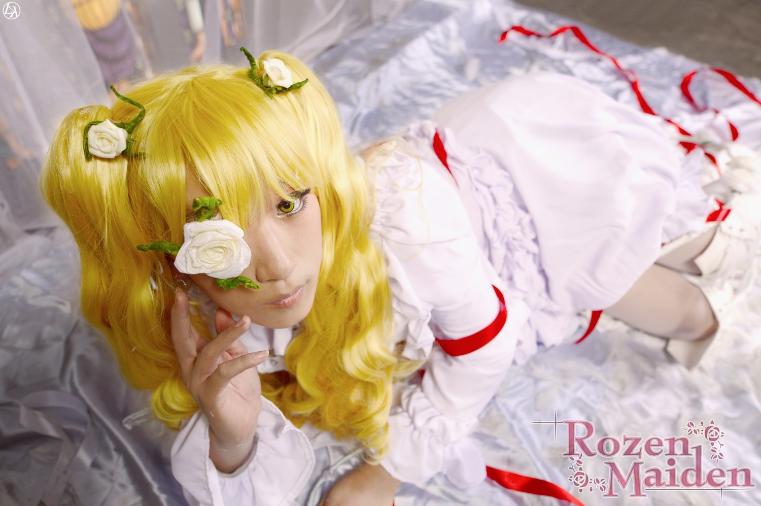 1girl artist_name auto_tagged blonde_hair blurry dated depth_of_field dress feathered_wings flower frills hair_ornament kirakishou lips long_hair looking_at_viewer ribbon rose solo white_dress white_flower white_rose white_wings wings yellow_eyes