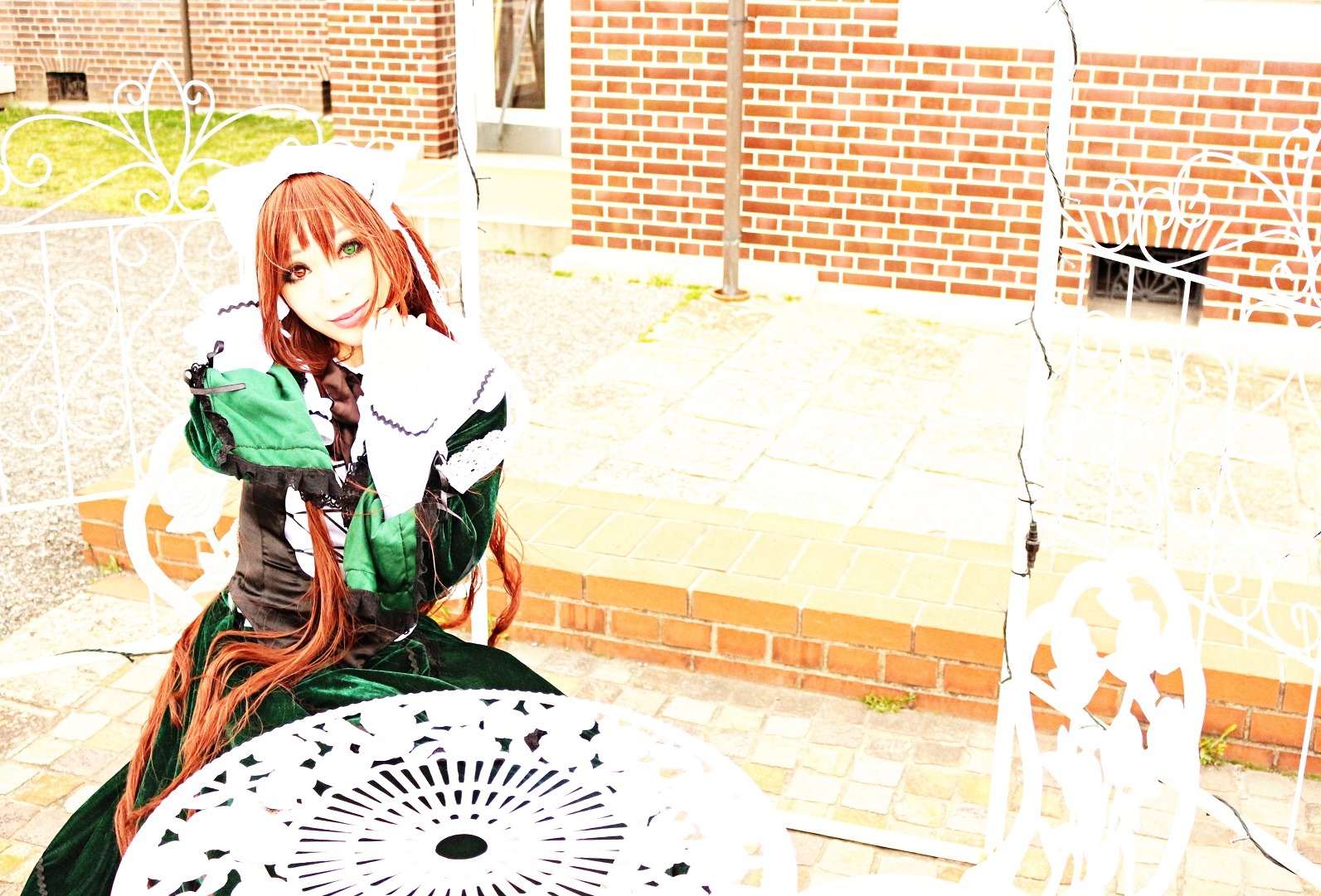 1girl braid building green_eyes heterochromia long_hair solo suiseiseki twin_braids