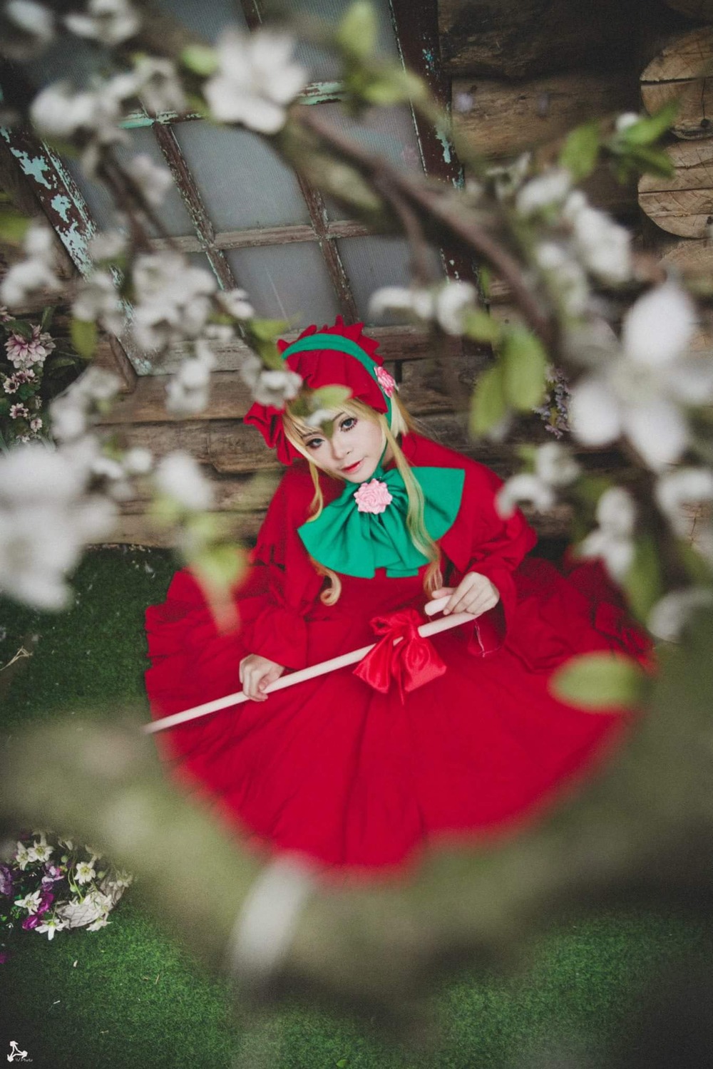 1girl blonde_hair blurry blurry_background blurry_foreground depth_of_field dress flower motion_blur photo red_dress shinku solo
