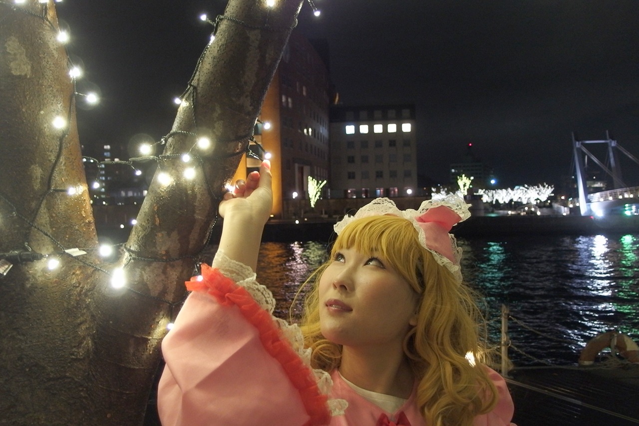 1girl blonde_hair building city city_lights cityscape hinaichigo long_hair night solo