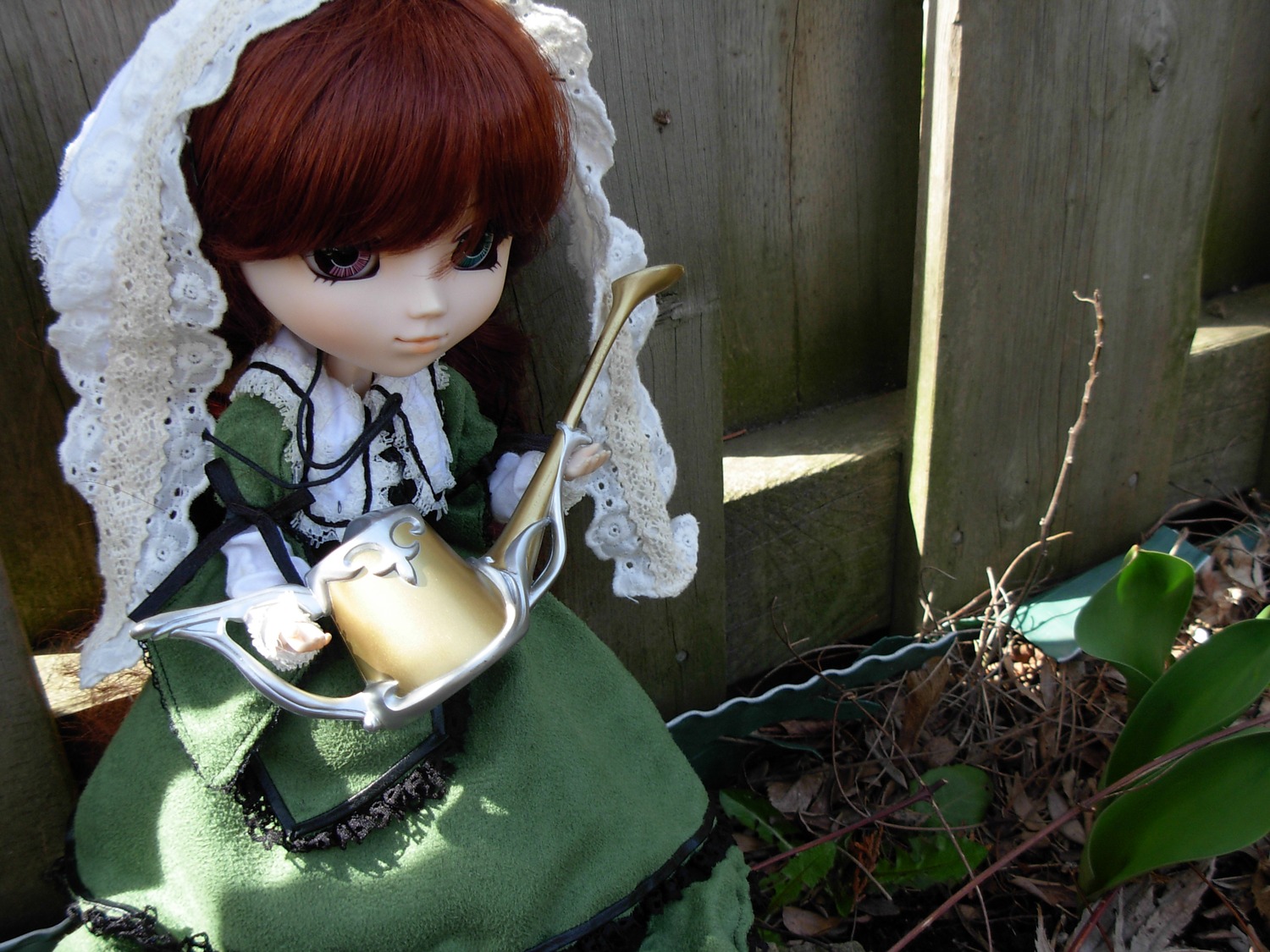 1boy brown_hair doll dress frills green_dress long_hair long_sleeves multiple_girls ribbon solo suiseiseki