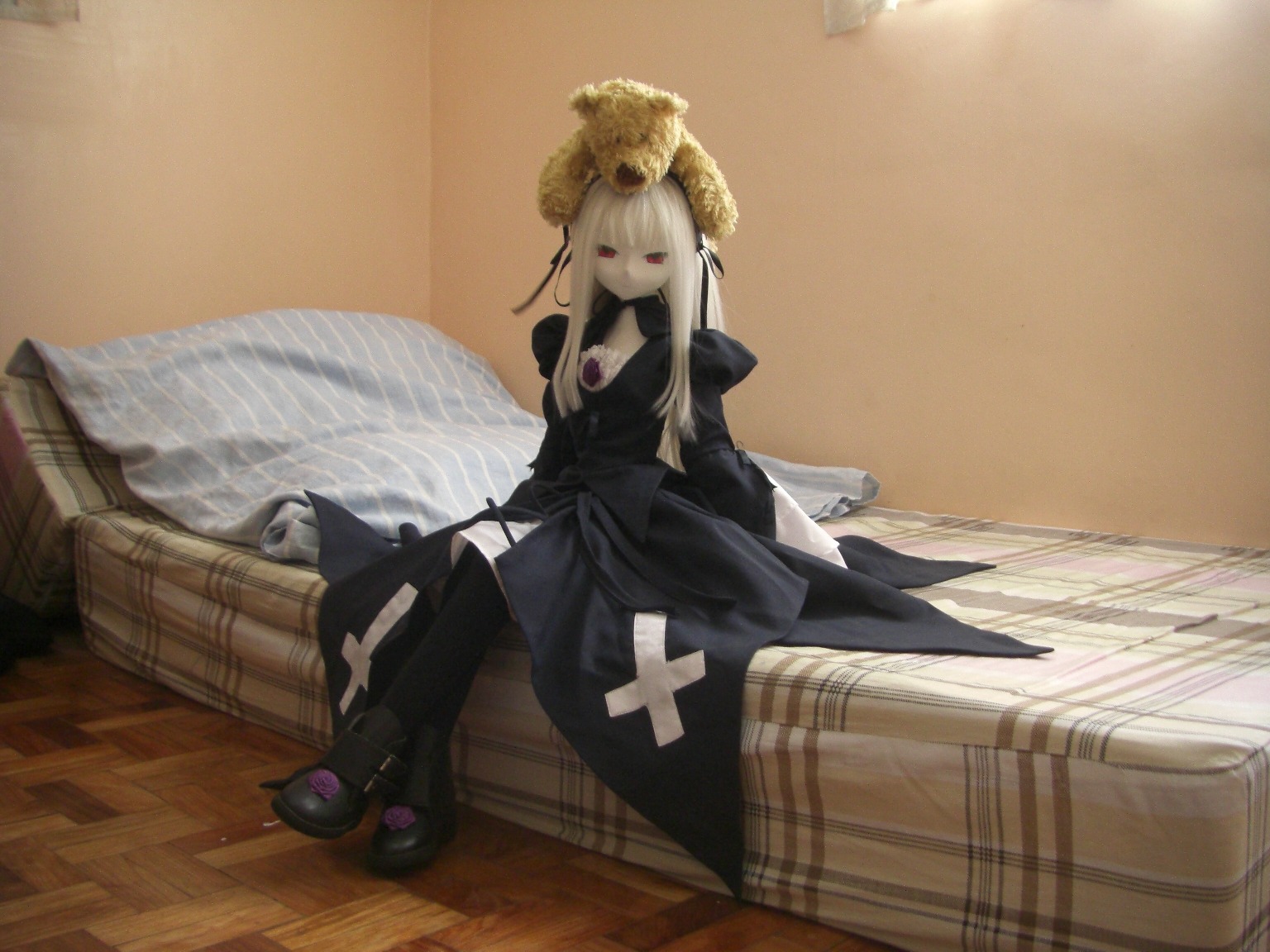 1girl doll dress long_hair long_sleeves red_eyes sitting solo suigintou white_hair wooden_floor
