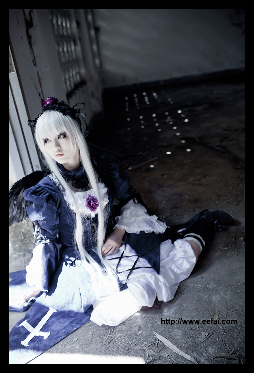 1girl auto_tagged black_border dress flower frills hairband letterboxed lips long_hair long_sleeves pillarboxed sitting solo suigintou wings