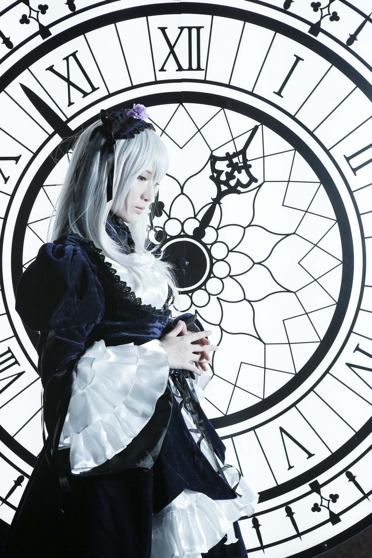 1girl closed_eyes dress flower hair_ornament long_hair long_sleeves monochrome solo standing suigintou