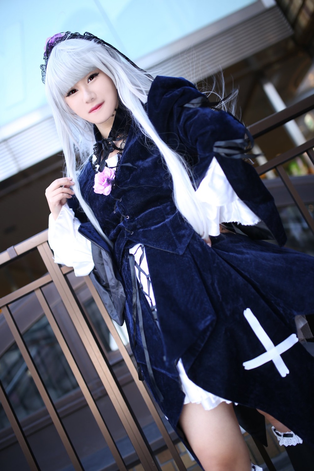 1girl 3d bangs blurry blurry_background depth_of_field dress frills gothic_lolita hairband lolita_fashion lolita_hairband long_hair long_sleeves looking_at_viewer solo standing suigintou
