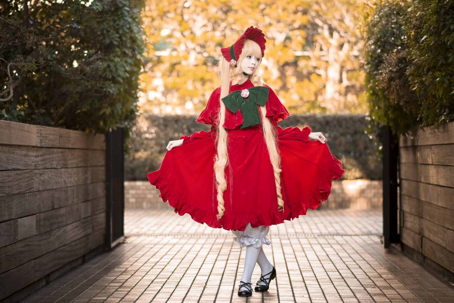 1girl apron blonde_hair bow dress fence frills outdoors pantyhose photo_background railing red_dress shinku shoes solo standing white_legwear