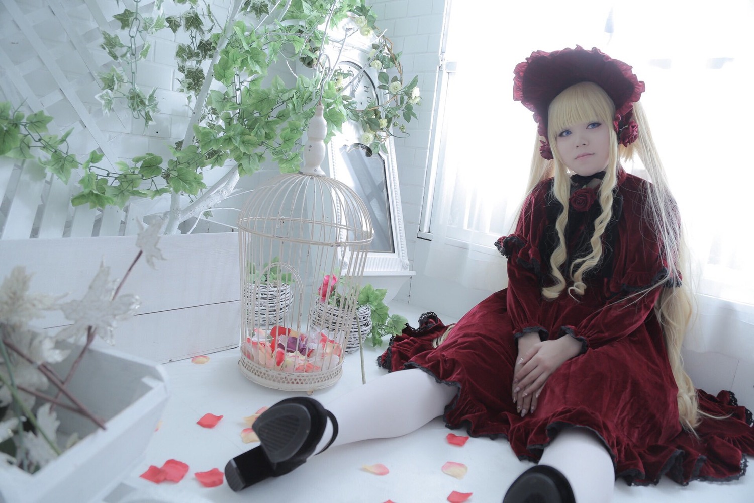1girl bangs birdcage blonde_hair blue_eyes bonnet cage dress flower hat lolita_fashion long_hair petals red_dress rose shinku shoes sitting solo