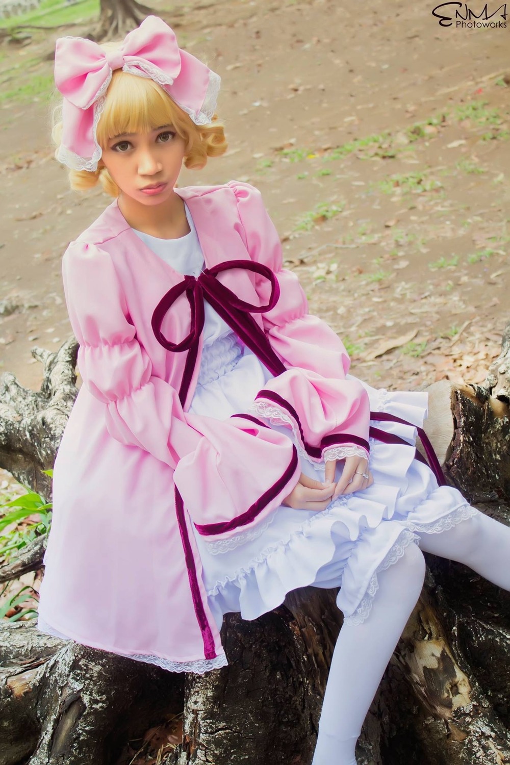 1girl artist_name blonde_hair bow dress frills hair_bow hinaichigo lips outdoors pantyhose photo pink_bow pink_dress realistic signature solo white_dress white_legwear
