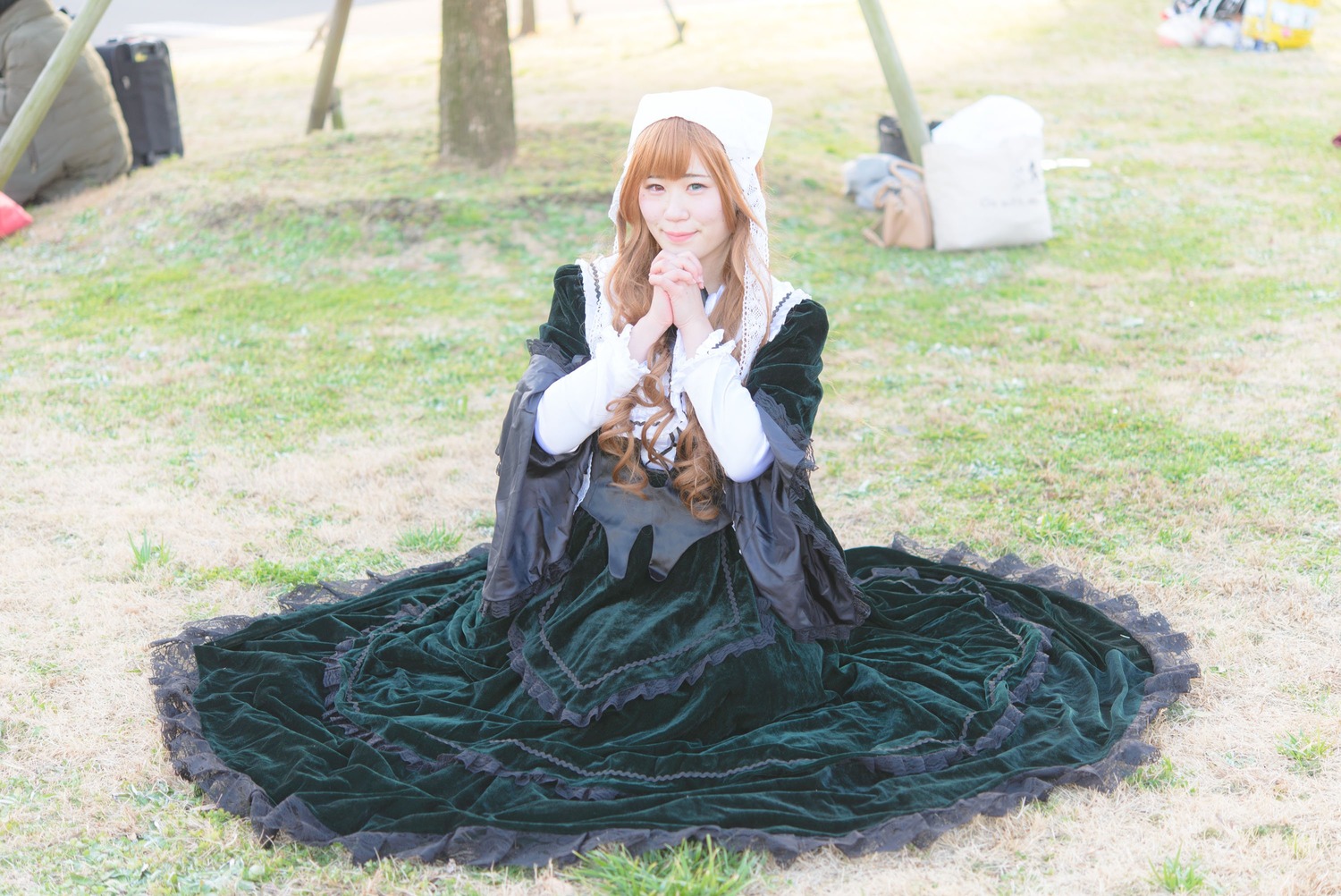 1girl black_dress blonde_hair blue_eyes dress flower long_hair long_sleeves nun sitting solo suiseiseki