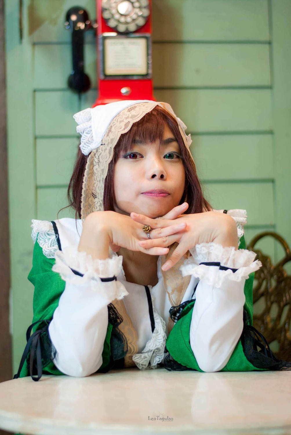 1girl 3d bangs blue_eyes blurry brown_hair depth_of_field dress lips long_hair photo sitting solo suiseiseki