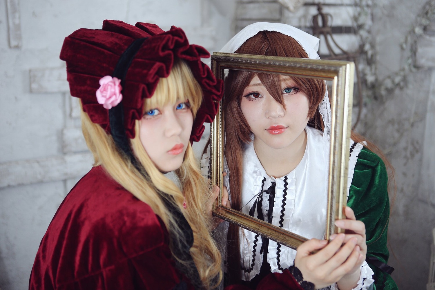 2girls blonde_hair blue_eyes blurry blurry_background bonnet brown_hair depth_of_field flower hat lips long_hair looking_at_viewer multiple_cosplay multiple_girls realistic rose shinku tagme