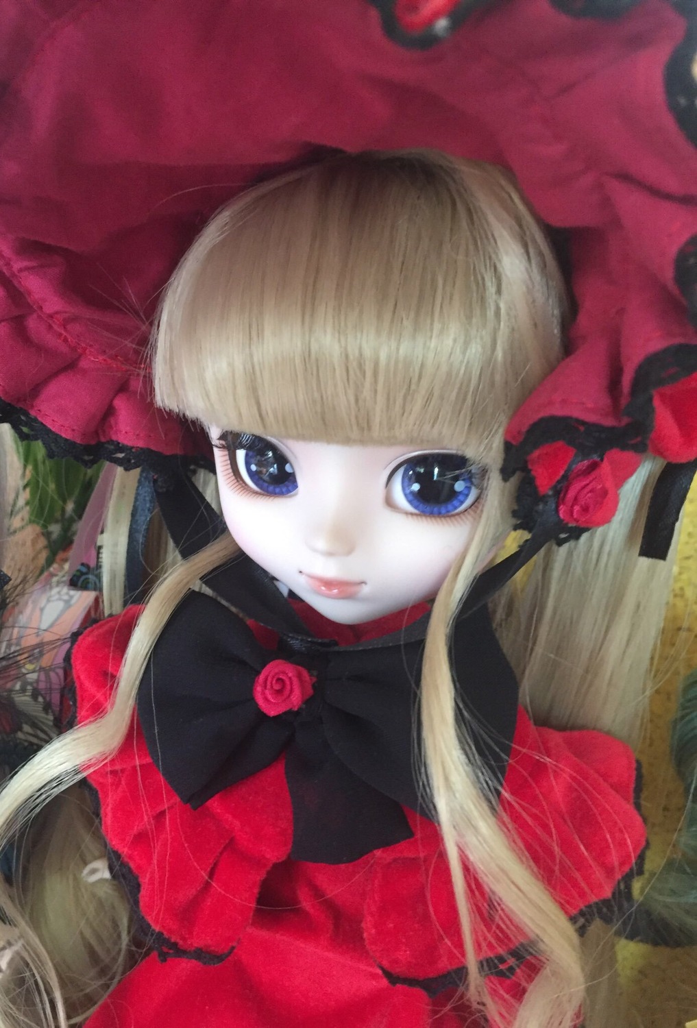 1girl bangs blonde_hair blue_eyes bow doll dress flower lips long_hair looking_at_viewer photo red_dress red_flower rose shinku solo upper_body