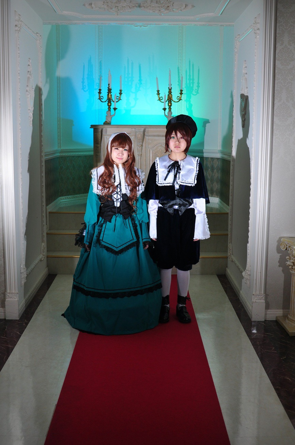 2girls black_footwear black_hair brown_hair closed_eyes dress indoors long_hair long_sleeves multiple_cosplay multiple_girls pantyhose shoes smile socks standing tagme white_legwear
