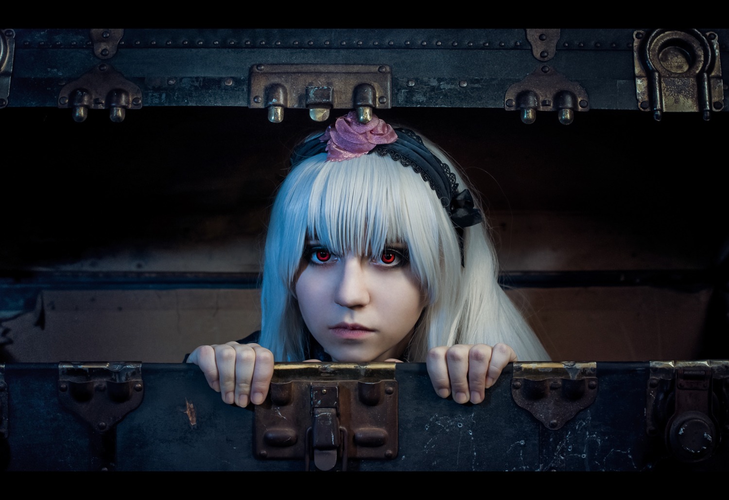 1girl hairband letterboxed lips long_hair parody red_eyes solo stuffed_animal suigintou
