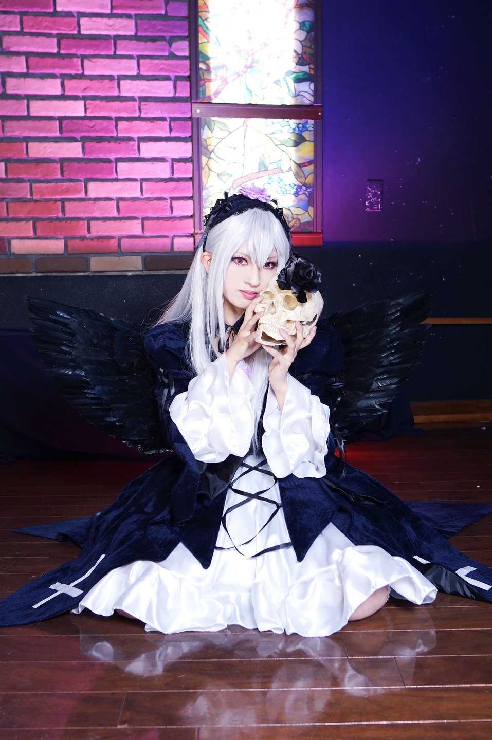 1girl bangs dress holding long_hair long_sleeves looking_at_viewer purple_eyes silver_hair sitting solo suigintou white_dress