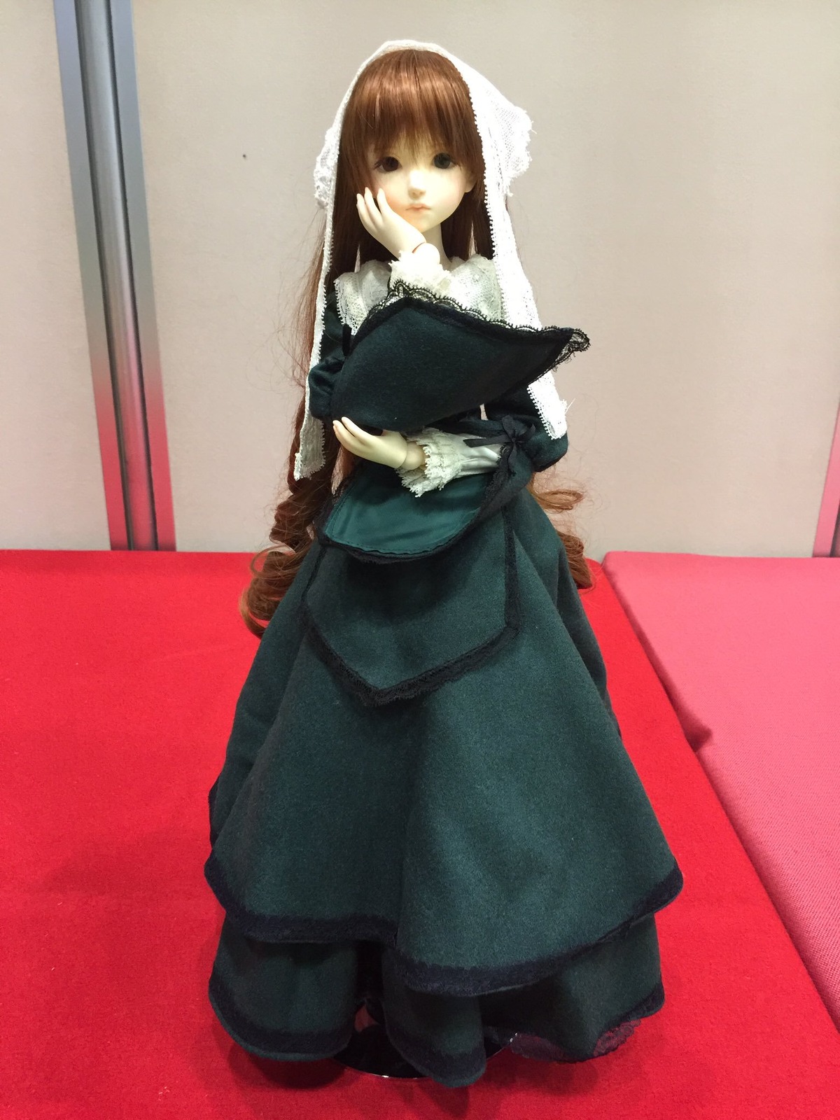 1girl animal bangs brown_hair doll dress full_body long_hair long_sleeves looking_at_viewer solo suiseiseki