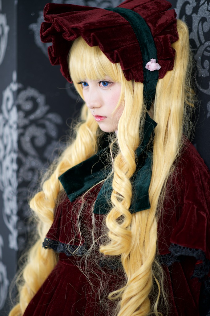 1girl bangs blonde_hair blue_eyes blurry blurry_background depth_of_field dress flower lace lips long_hair red_dress shinku solo