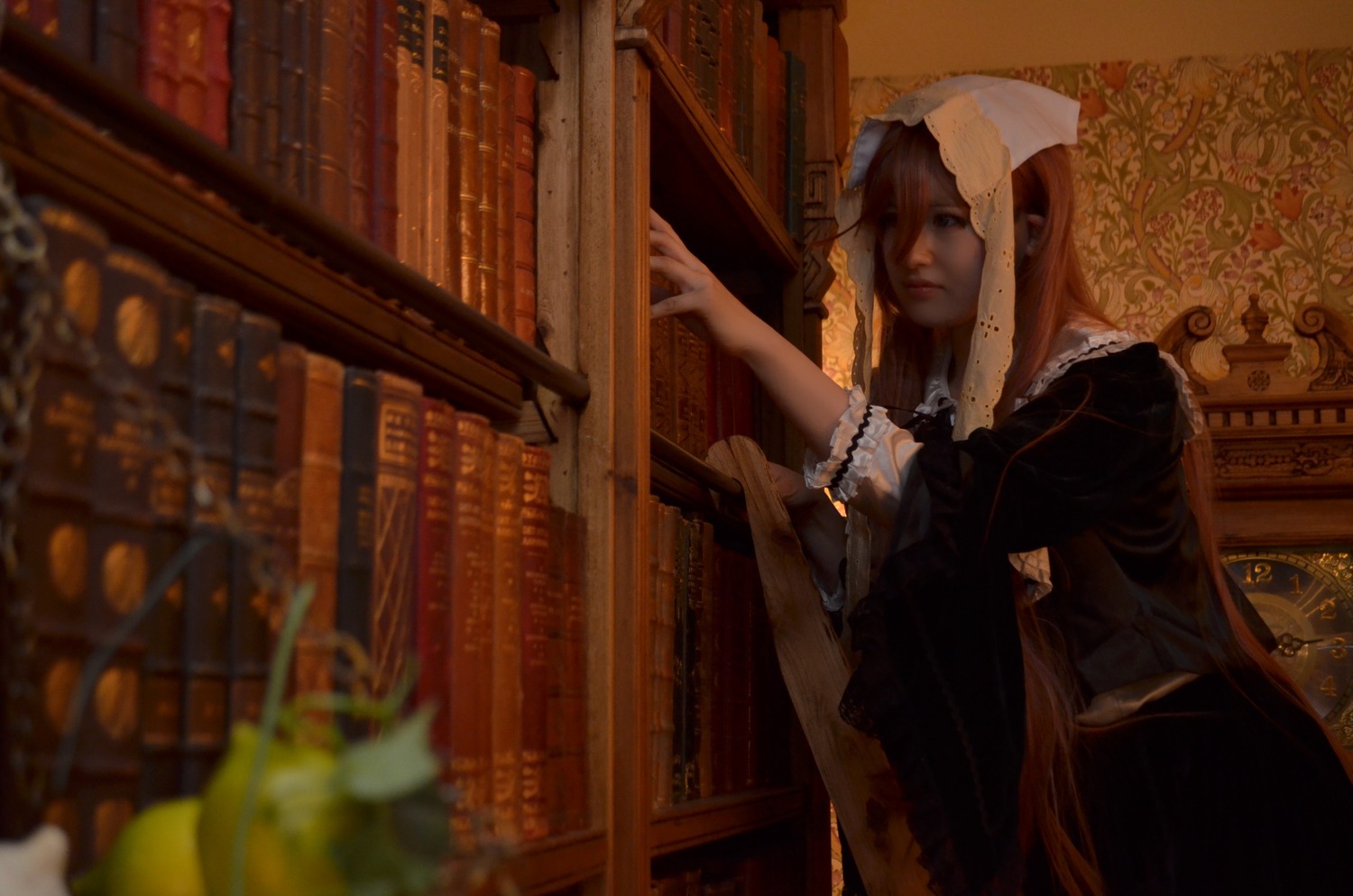1girl apron blue_eyes blurry book bookshelf depth_of_field dress habit indoors jewelry long_hair nun solo