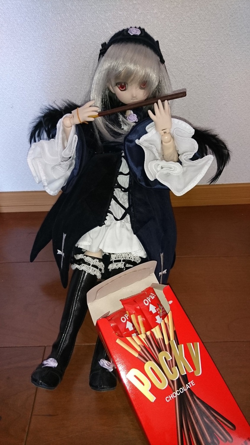 1girl black_legwear doll dress holding long_sleeves looking_at_viewer red_eyes shoes solo standing suigintou thighhighs