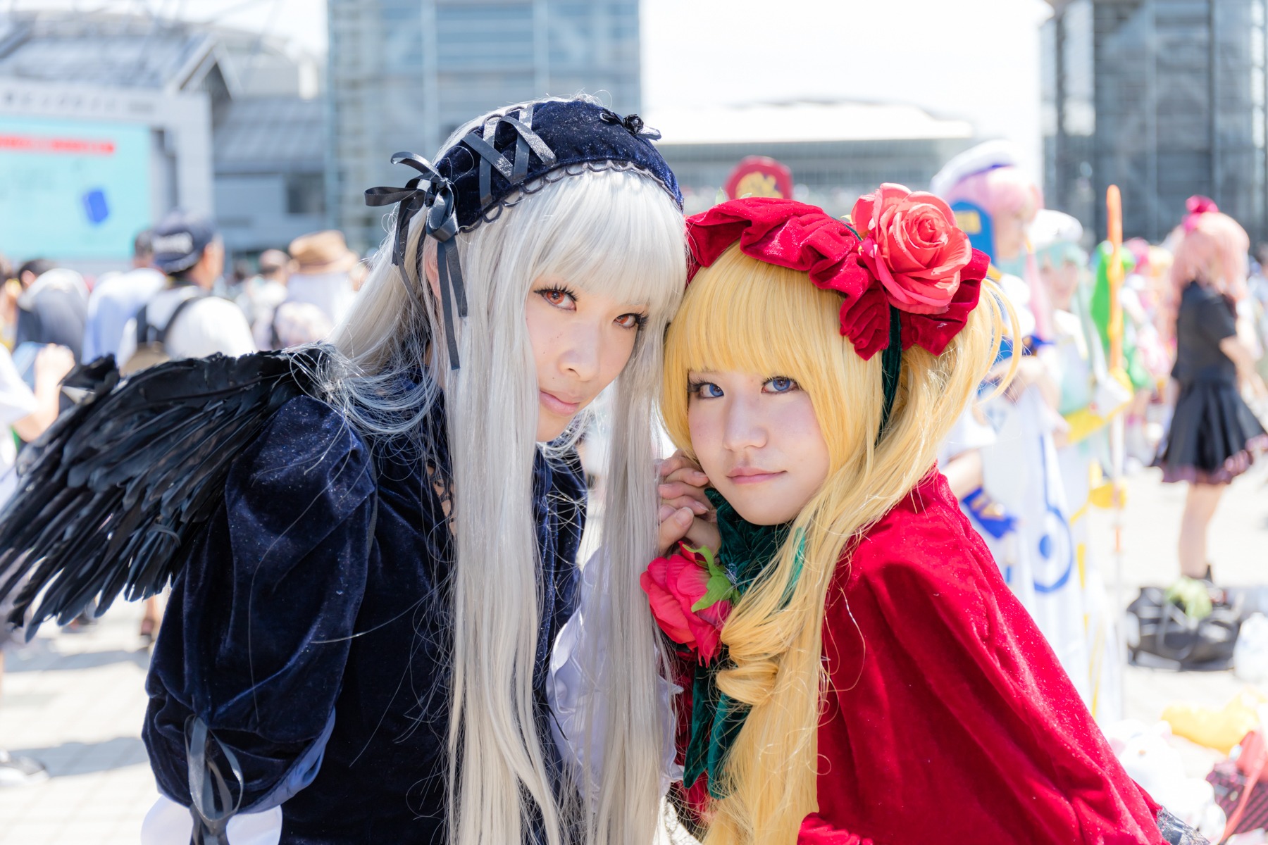 3girls black_wings blonde_hair blue_eyes blurry blurry_background blurry_foreground depth_of_field dress feathered_wings flower frills hairband long_hair long_sleeves looking_at_viewer multiple_cosplay multiple_girls photo shinku silver_hair suigintou tagme wings