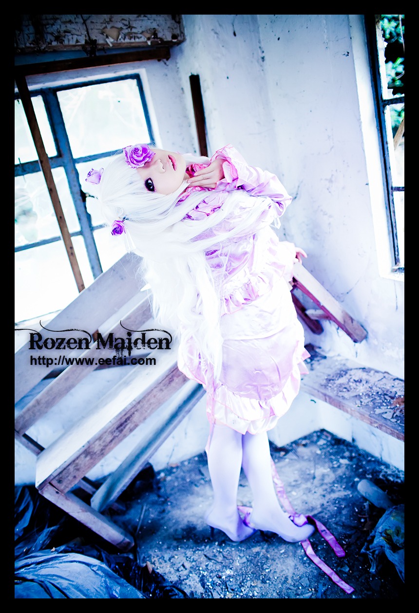 1girl barasuishou barefoot black_border blood blue_eyes dress english_text flower gun hair_ornament letterboxed long_hair pillarboxed solo weapon white_hair