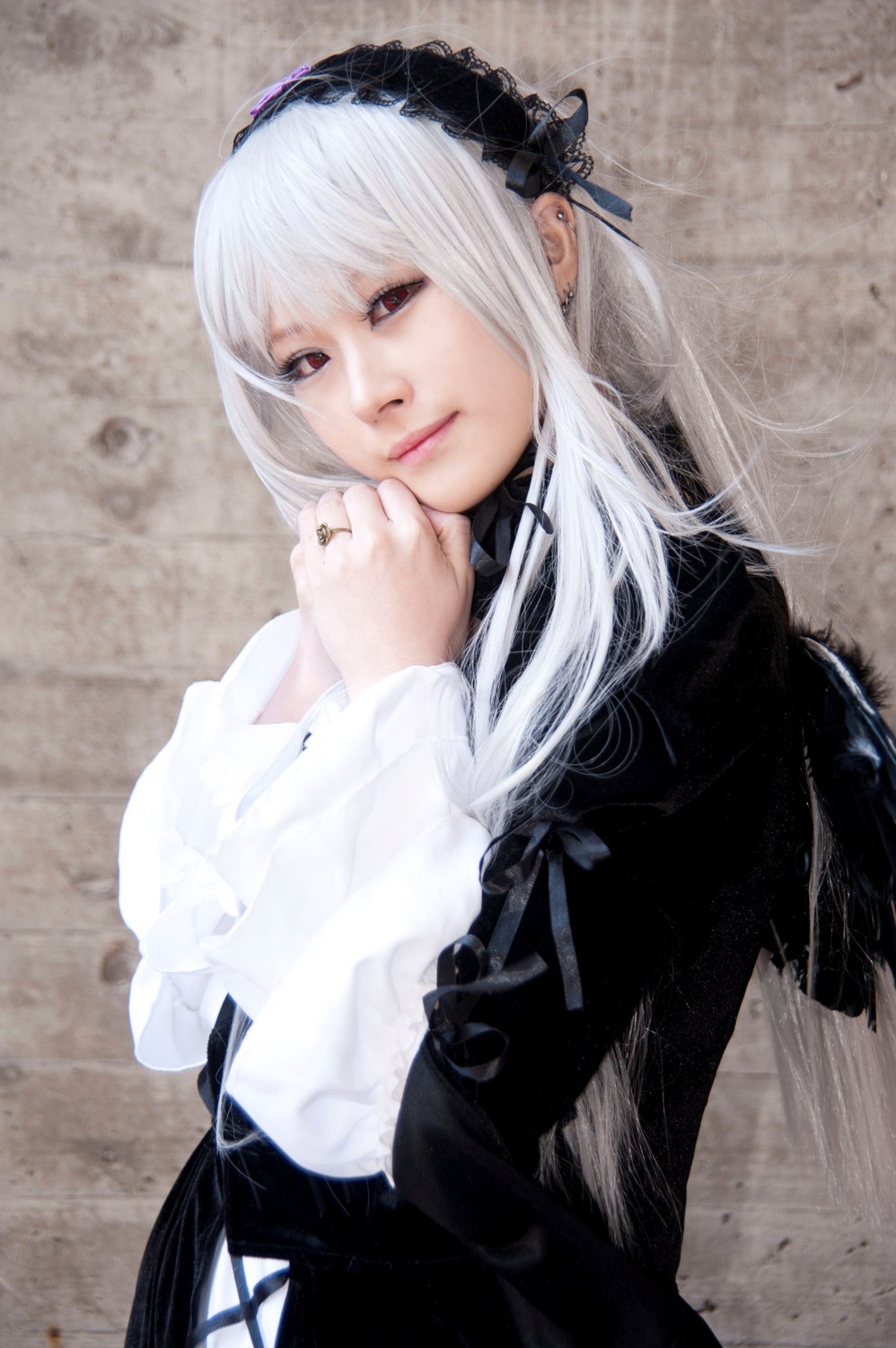 1girl bangs closed_mouth earrings hairband jewelry lips long_hair long_sleeves looking_at_viewer red_eyes ring solo suigintou upper_body white_hair