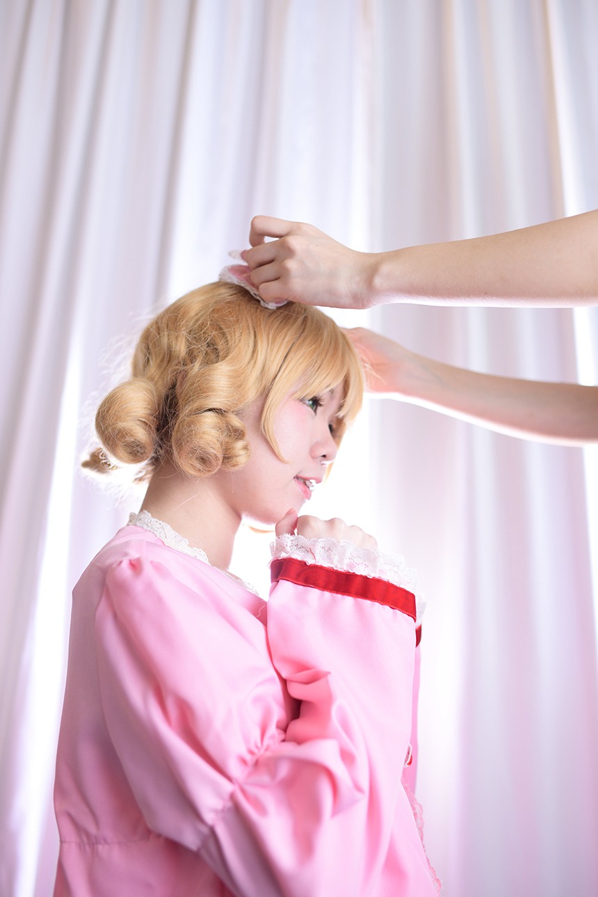 1girl blonde_hair blue_eyes curtains hair_bun hinaichigo indoors jewelry lips nose profile realistic solo striped upper_body vertical_stripes window