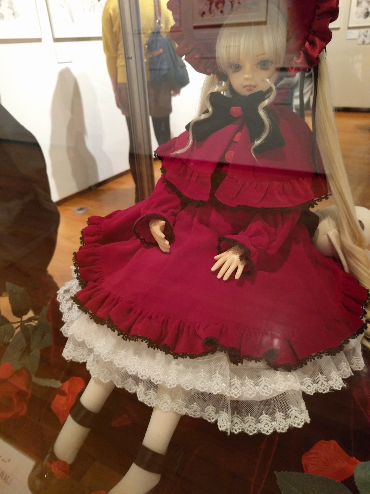 1girl blonde_hair blue_eyes bonnet doll dress flower frills lolita_fashion long_hair long_sleeves photo red_dress rose shinku solo standing