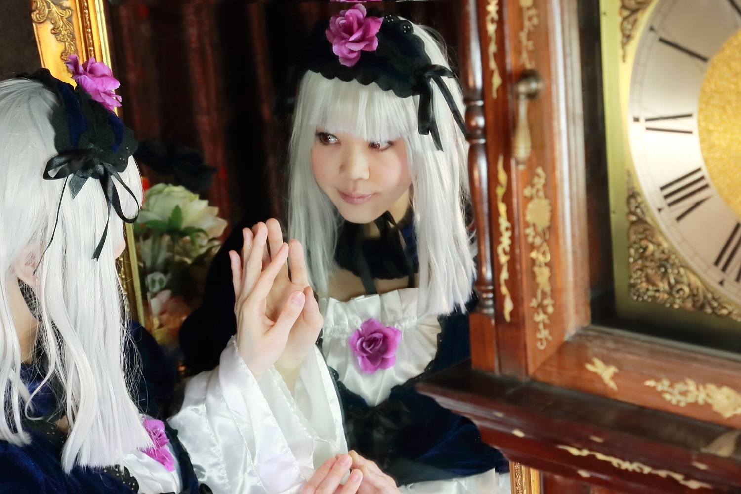 2girls bangs dress flower frills long_hair multiple_girls silver_hair solo suigintou