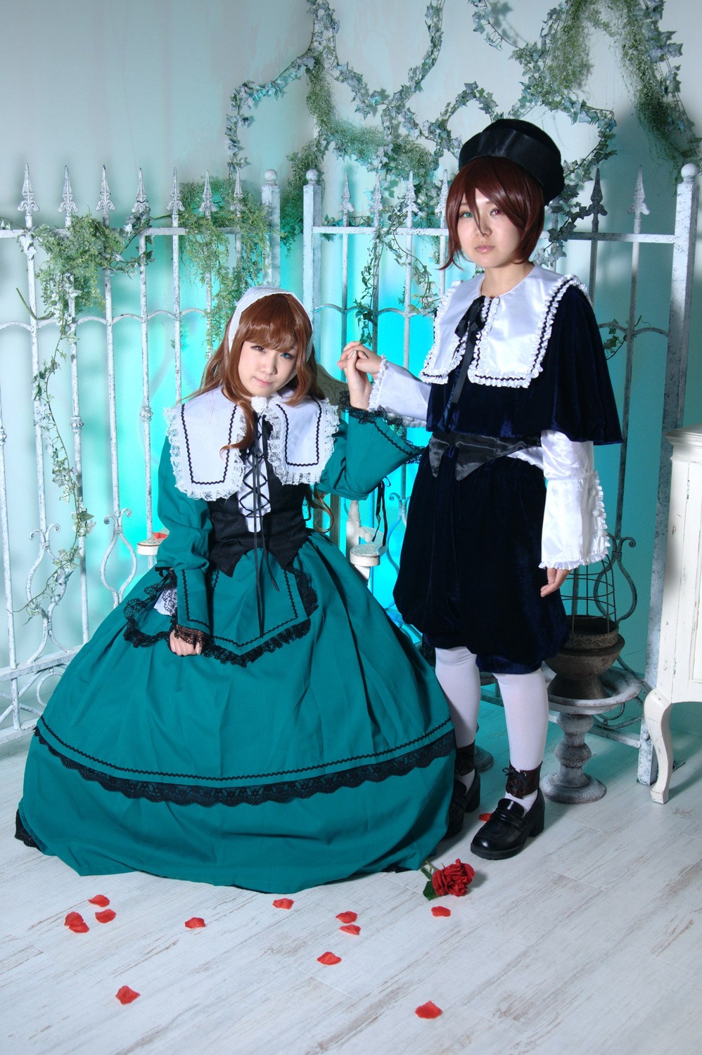 2girls brown_hair dress flower green_dress hat holding_hands long_sleeves looking_at_viewer multiple_cosplay multiple_girls pantyhose petals plant rose shoes short_hair siblings sisters souseiseki standing tagme tree twins white_legwear