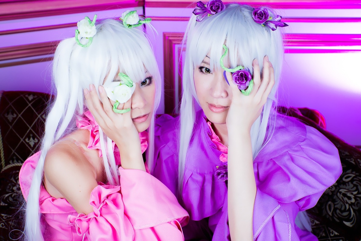 2girls eyepatch flower hair_ornament hands_on_own_face lips long_hair multiple_cosplay multiple_girls purple_flower rose silver_hair smile tagme twins