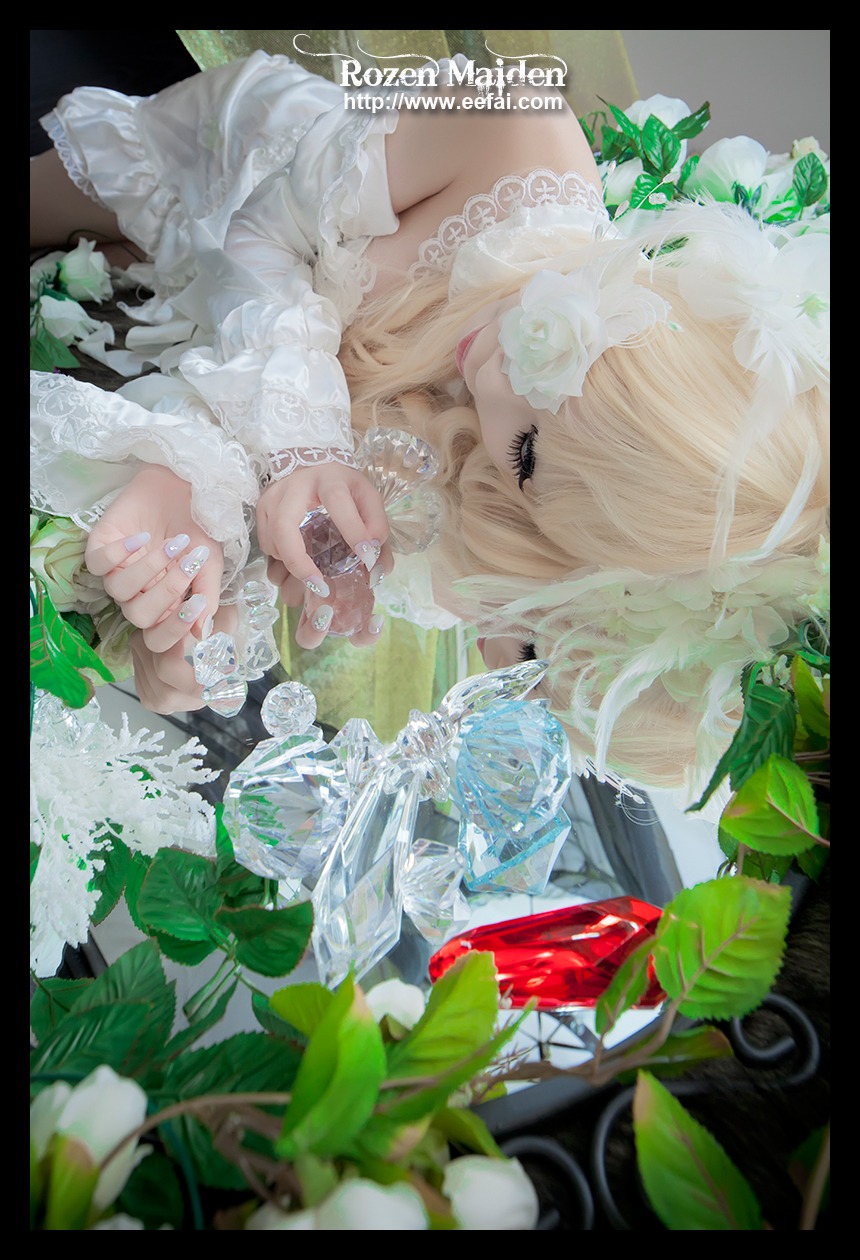 1girl bare_shoulders black_border blonde_hair closed_eyes dress flower kirakishou leaf letterboxed long_hair plant solo upper_body white_dress white_flower white_rose