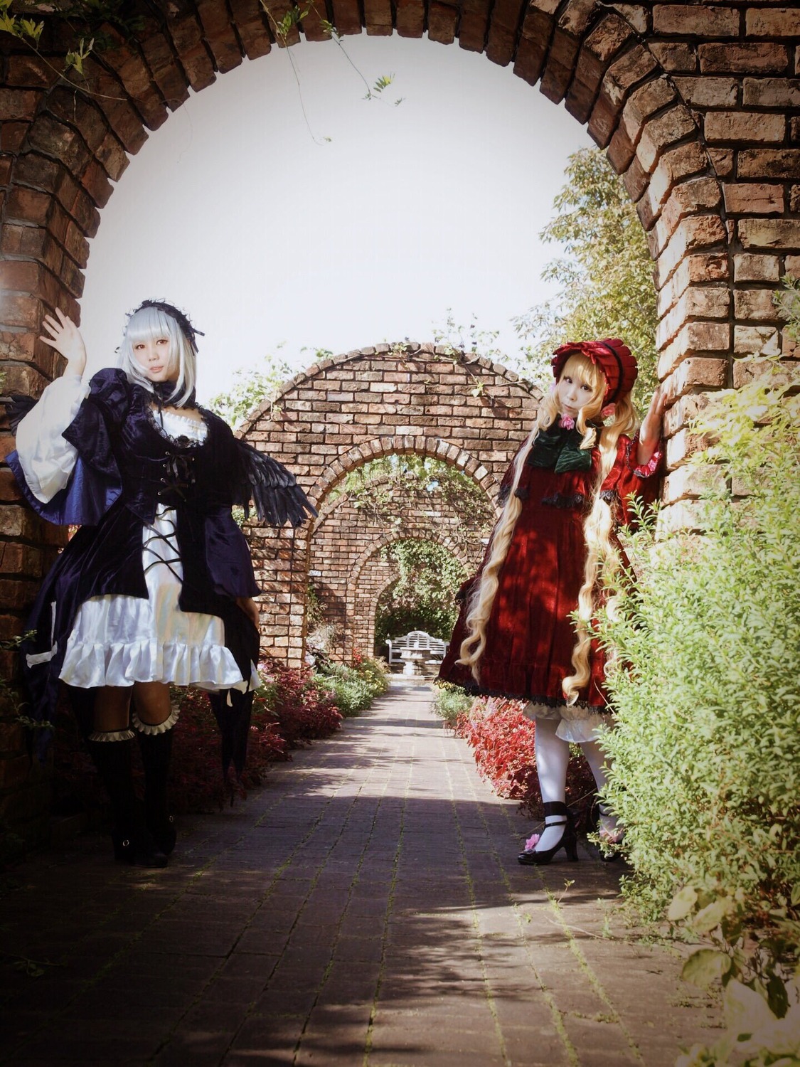 2girls blonde_hair dress flower long_hair long_sleeves multiple_cosplay multiple_girls silver_hair standing suigintou tagme