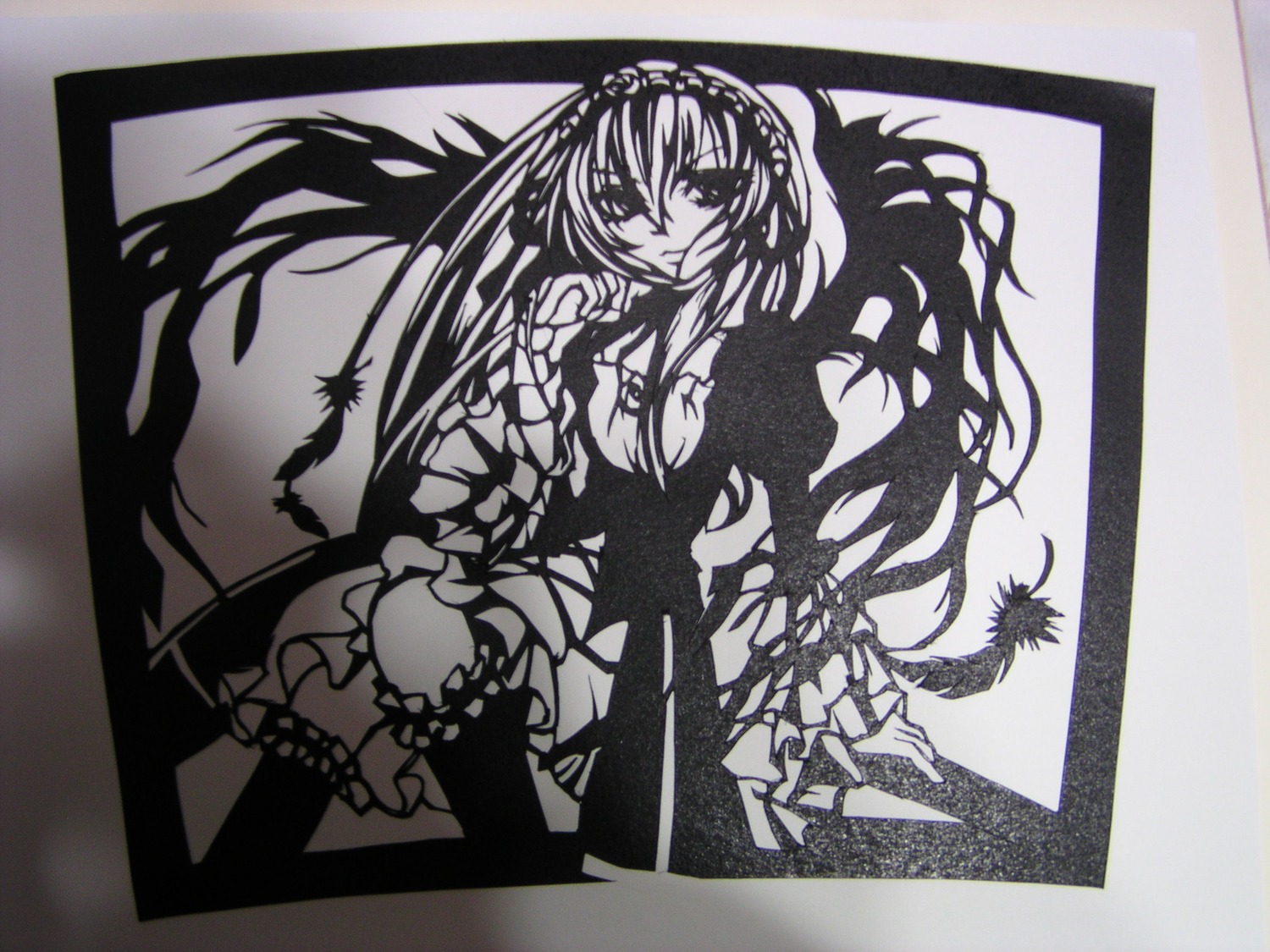 1girl dress frills hairband image lolita_hairband long_hair long_sleeves looking_at_viewer monochrome sitting solo suigintou very_long_hair wings