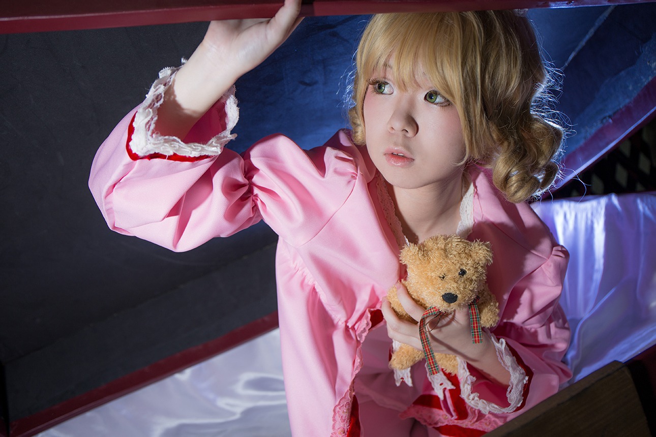 1girl blonde_hair dress green_eyes hinaichigo lips pink_dress realistic solo stuffed_animal