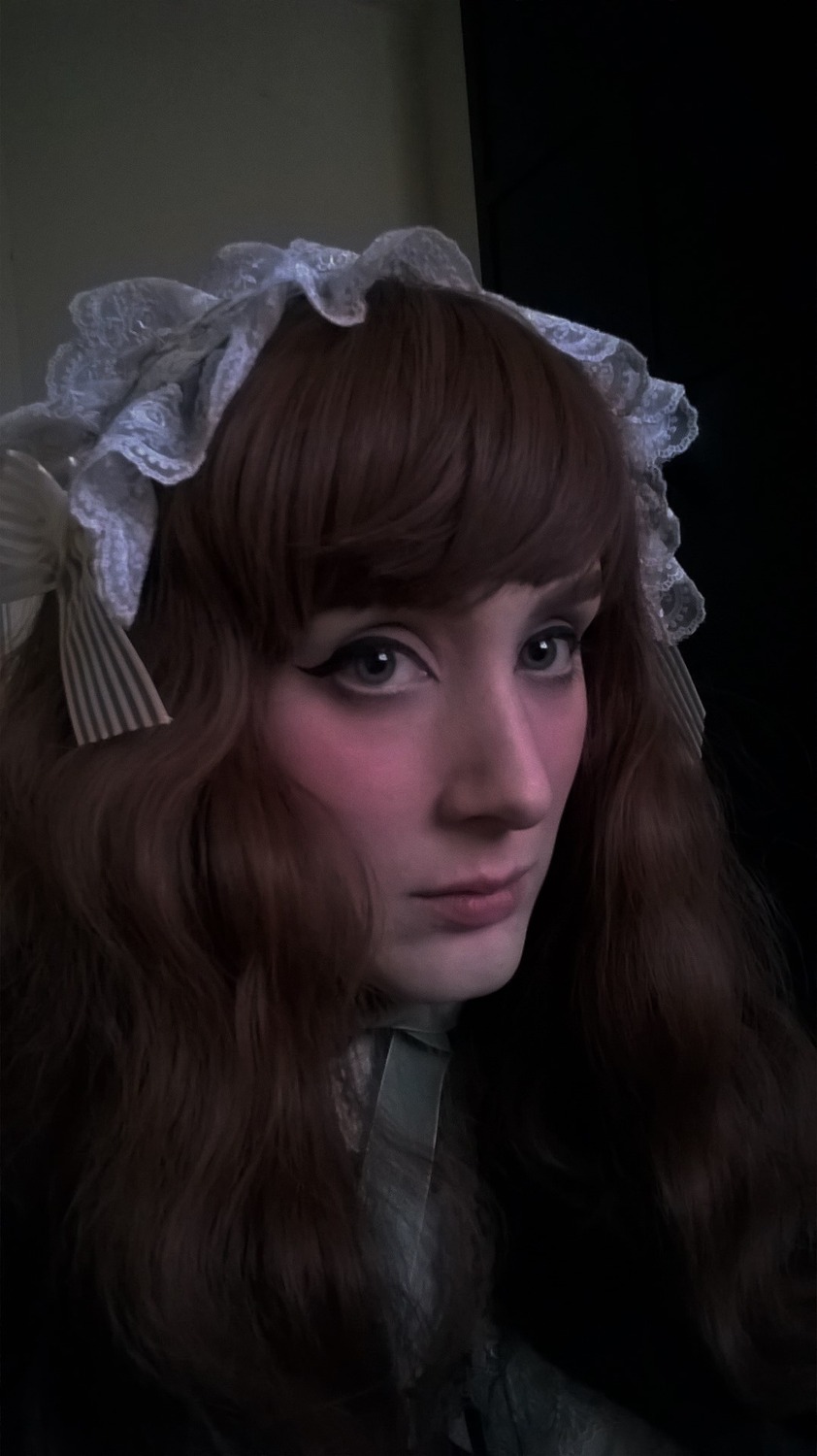1girl bangs brown_hair closed_mouth eyelashes face flower hair_flower hair_ornament lips long_hair looking_at_viewer nose portrait realistic solo suigintou white_flower