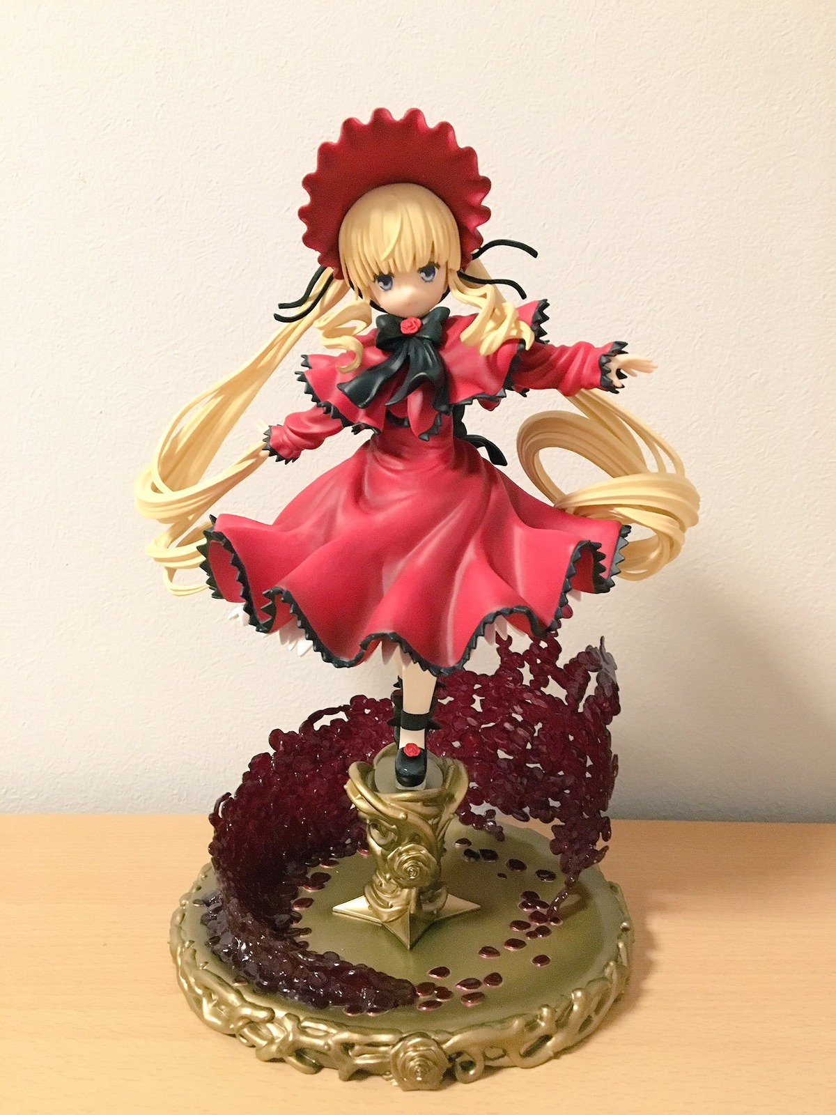 1girl blonde_hair blue_eyes bonnet bow bowtie capelet doll dress full_body long_hair long_sleeves looking_at_viewer red_dress shinku solo standing twintails very_long_hair