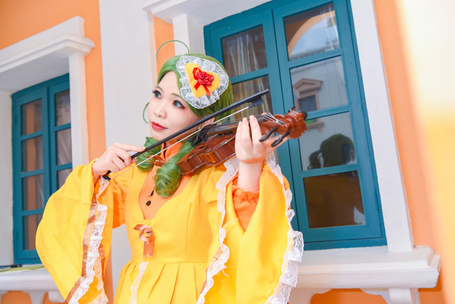 1girl ahoge blue_eyes dress frills indoors kanaria photo solo wide_sleeves yellow_dress